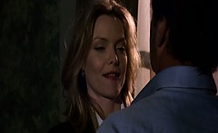 Michelle Pfeiffer nude but covered in hot love scene with a