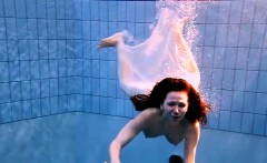 Andrea shows nice body underwater