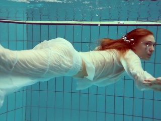 Redhead Diana hot and horny in a white dress