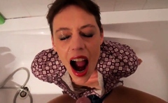 Short hair mature takes facial in the bathtub