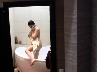 Stunning brunette getting of the shower naked