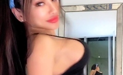 Busty babe playing with her big boobs